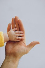baby and parents hands